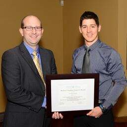 Dr. Stockley presenting Ms. Morag Ryan with the 2017 Medical Student Oration Award